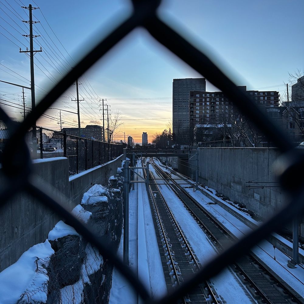 train tracks covered in snow